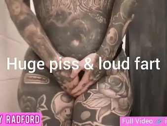 Melody Radford's inked bod gets wet in piss and farts like a professional